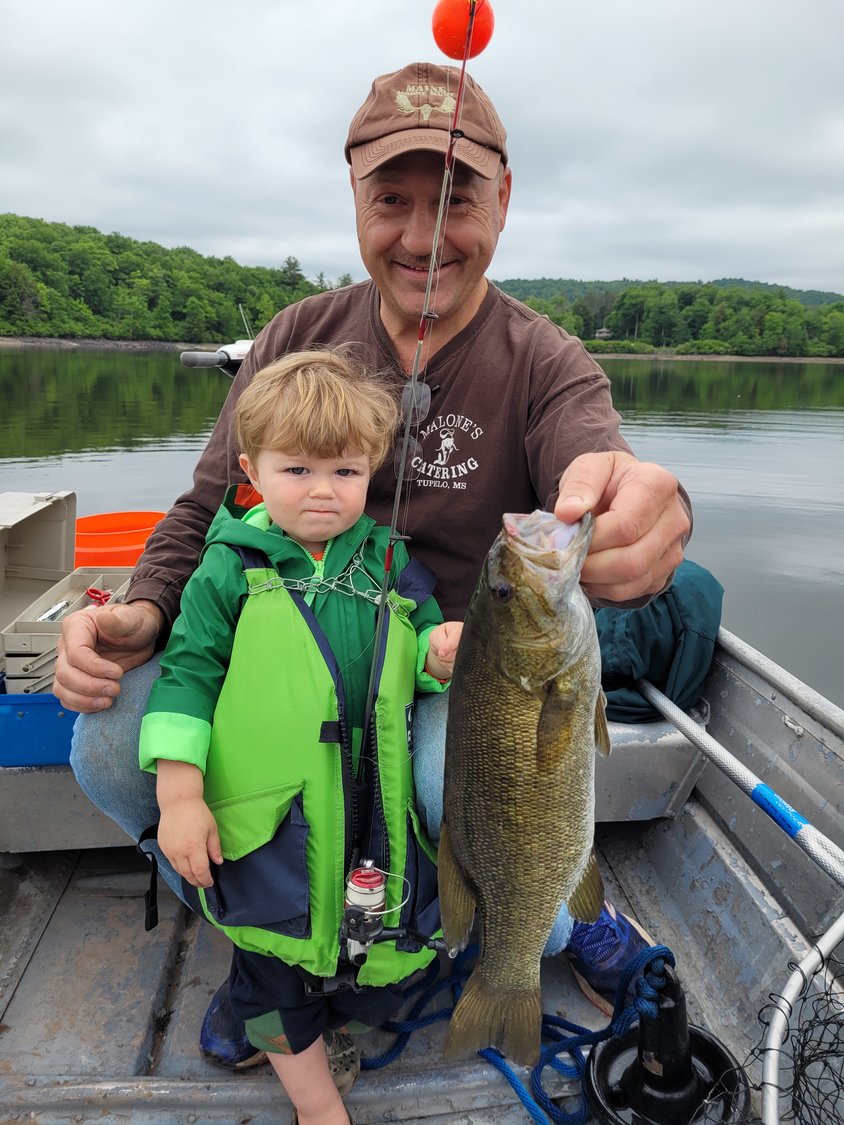 My son’s first fish, caught NOT on Father’s Day.